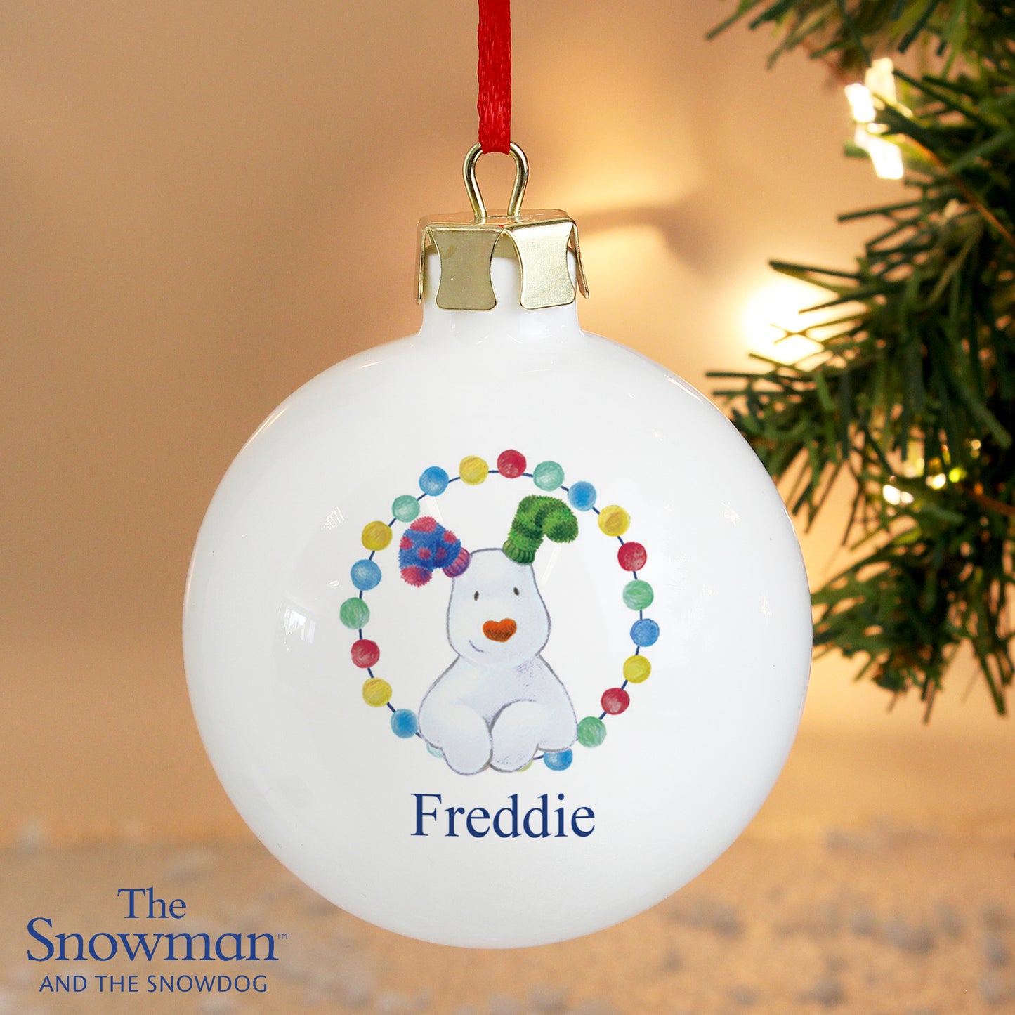 Personalised The Snowdog Ceramic Christmas Bauble