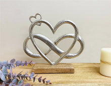 Metal Silver Entwined Eternity Hearts on Wooden Base