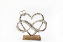 Metal Silver Entwined Eternity Hearts on Wooden Base